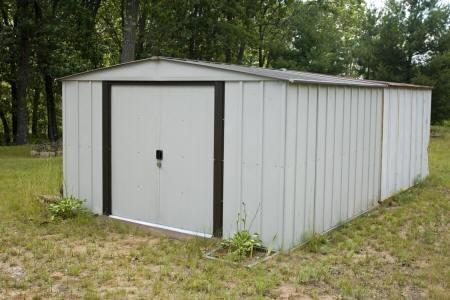 property for sale with two storage sheds