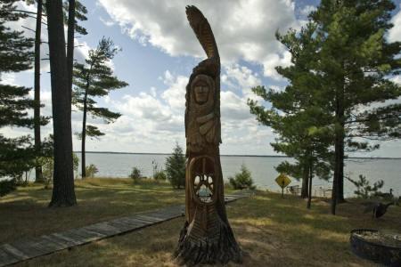 custom carved Indian - private stairs and dock and Lake Petenwell, WI.