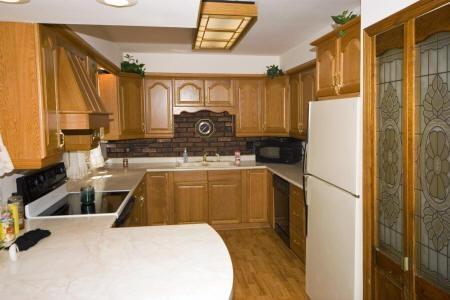 Spacious Kitchen Including Refrigerator, Microwave & Stove
