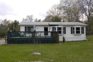 beautiful 2 bedroom home w/ 2 pole sheds