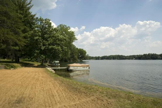 600 plus feet of sandy shoreline on big Roche-A-Cri Lake, wi
