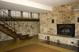 Stone fireplaces upstairs and down