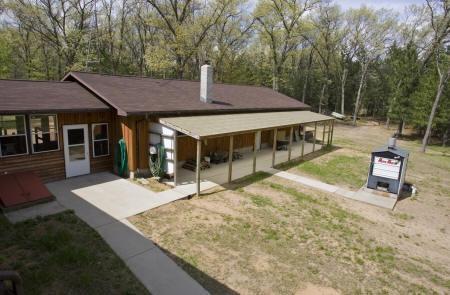home for sale with outdoor woodstove