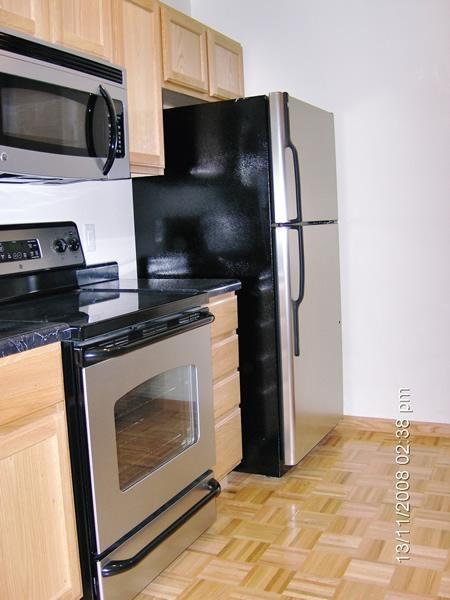 landscaped condo land in wooded area