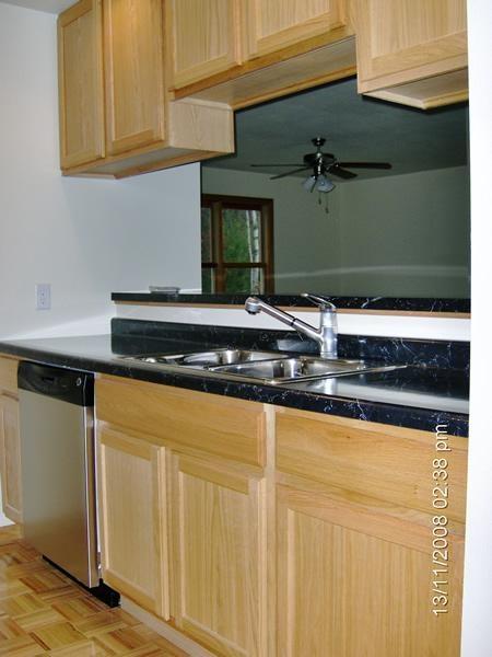 spacious kitchen with steel built-in appliances included