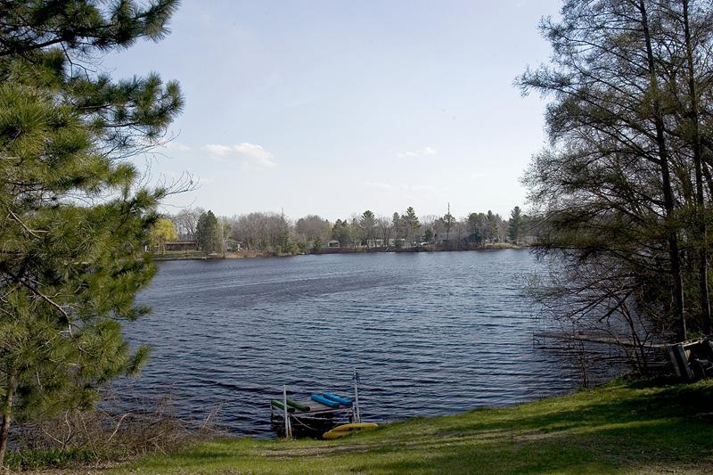 Enjoy the view of Friendship Lake from your wraparound deck