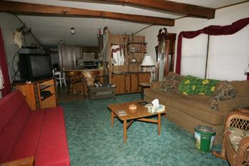 Large Living Room With Beamed Ceilings