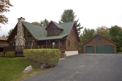 Custom Log Home With Castle Rock Lake Waterfrontage