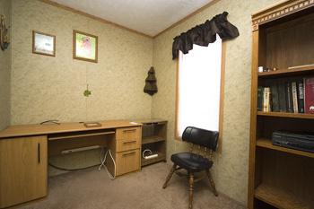 Cozy Office With Wooded Furnishings