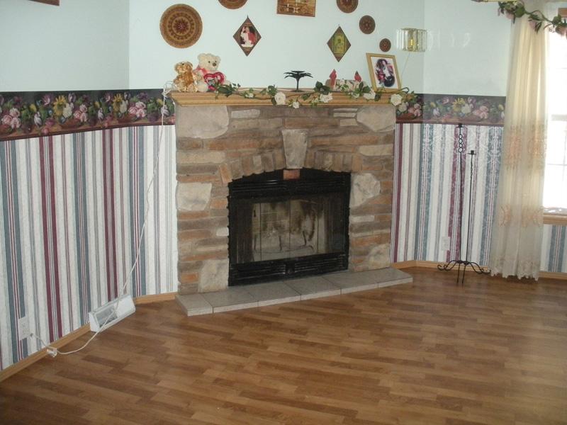 Beautiful Woodburning Fireplace In Livingroom