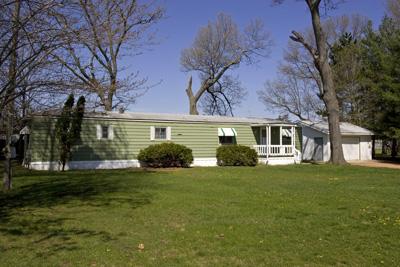 Plenty Of Room To Move With Enclosed Porch Area!