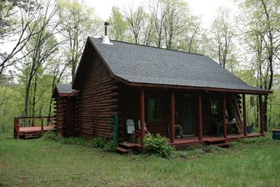 Beautiful Log home For Sale On Wolf Lake
